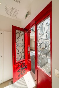 ATELIER D'ARCHITECTURE ELC PASSAGE REILHAC PORTE D’ENTRÉE D'UN BÂTIMENT DU PASSAGE RESTAURÉE